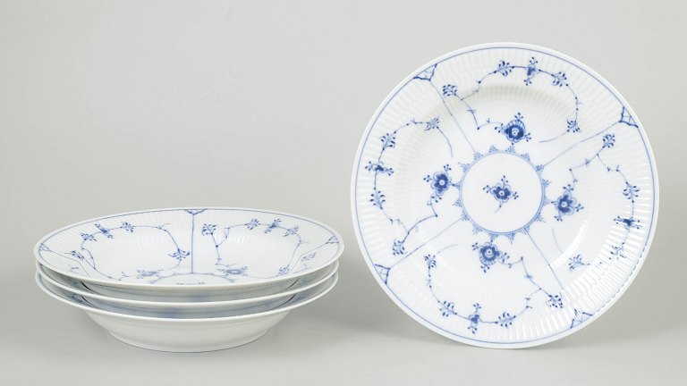 Royal Copenhagen Musselmalet Riflet, sæt af fire dybe tallerkener.